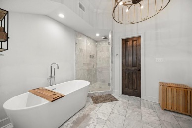 Experience luxury living on the water in sought-after Canebrake! on Canebrake Country Club in Mississippi - for sale on GolfHomes.com, golf home, golf lot