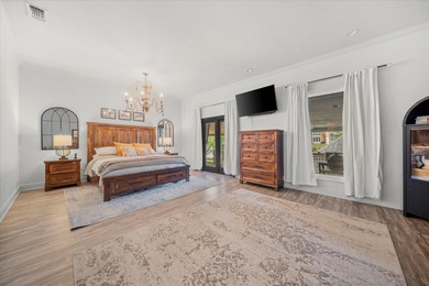 Experience luxury living on the water in sought-after Canebrake! on Canebrake Country Club in Mississippi - for sale on GolfHomes.com, golf home, golf lot