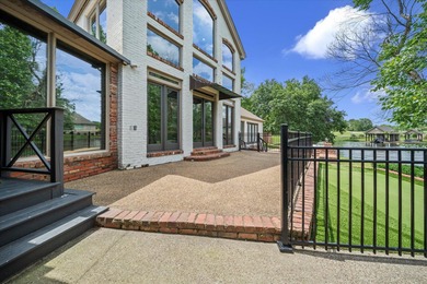 Experience luxury living on the water in sought-after Canebrake! on Canebrake Country Club in Mississippi - for sale on GolfHomes.com, golf home, golf lot