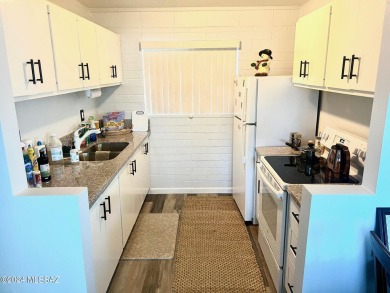 Wonderful second story remodeled end unit featuring: 1-bedroom on Randolph Park Golf Courses in Arizona - for sale on GolfHomes.com, golf home, golf lot