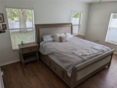 AS IS. A turn-key and versatile 4-bedroom house. New roof on Meadow Oaks Golf and Country Club in Florida - for sale on GolfHomes.com, golf home, golf lot