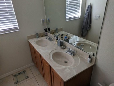 AS IS. A turn-key and versatile 4-bedroom house. New roof on Meadow Oaks Golf and Country Club in Florida - for sale on GolfHomes.com, golf home, golf lot