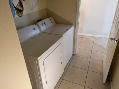 AS IS. A turn-key and versatile 4-bedroom house. New roof on Meadow Oaks Golf and Country Club in Florida - for sale on GolfHomes.com, golf home, golf lot