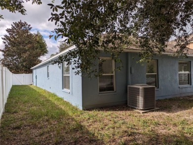 AS IS. A turn-key and versatile 4-bedroom house. New roof on Meadow Oaks Golf and Country Club in Florida - for sale on GolfHomes.com, golf home, golf lot