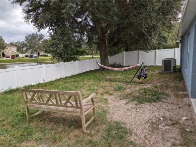 AS IS. A turn-key and versatile 4-bedroom house. New roof on Meadow Oaks Golf and Country Club in Florida - for sale on GolfHomes.com, golf home, golf lot
