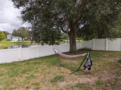 AS IS. A turn-key and versatile 4-bedroom house. New roof on Meadow Oaks Golf and Country Club in Florida - for sale on GolfHomes.com, golf home, golf lot