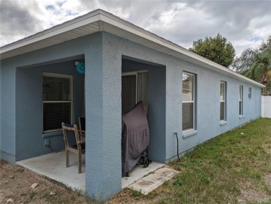 AS IS. A turn-key and versatile 4-bedroom house. New roof on Meadow Oaks Golf and Country Club in Florida - for sale on GolfHomes.com, golf home, golf lot