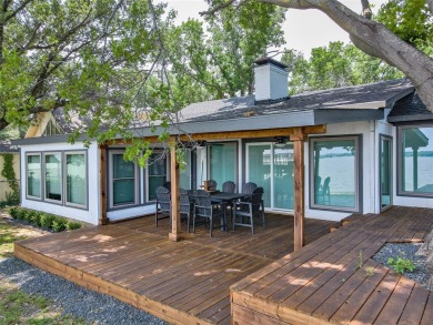 GORGEOUS and COMPLETELY RENOVATED Lake House in an AWESOME on Cedar Creek Country Club in Texas - for sale on GolfHomes.com, golf home, golf lot