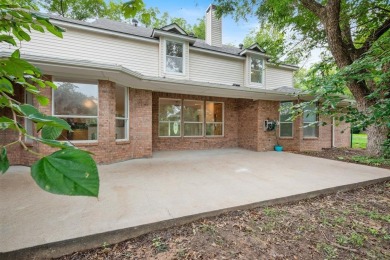 Welcome to this spacious home in the gated community of Pecan on Pecan Plantation Country Club in Texas - for sale on GolfHomes.com, golf home, golf lot