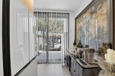 Welcome to an exquisite condo living in Boca West Country Club on Boca West Golf and Country Club in Florida - for sale on GolfHomes.com, golf home, golf lot
