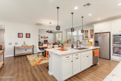 Discover the perfect blend of elegance and modern living in this on Verrado Golf Club - Victory in Arizona - for sale on GolfHomes.com, golf home, golf lot