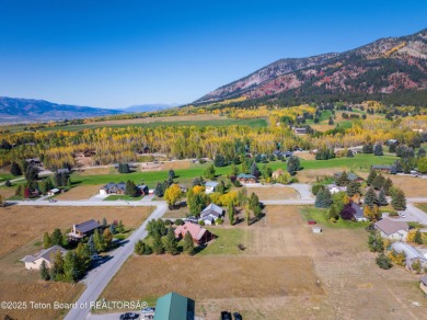 This beautiful log home combines rustic charm with modern on Star Valley RV Golf Course in Wyoming - for sale on GolfHomes.com, golf home, golf lot