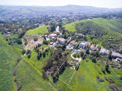 This luxurious estate known as *Ivy's Gate* is an 8,700 square on Marbella Golf and Country Club in California - for sale on GolfHomes.com, golf home, golf lot