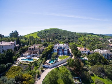This luxurious estate known as *Ivy's Gate* is an 8,700 square on Marbella Golf and Country Club in California - for sale on GolfHomes.com, golf home, golf lot