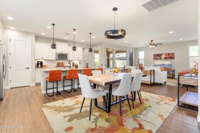 Discover the perfect blend of elegance and modern living in this on Verrado Golf Club - Victory in Arizona - for sale on GolfHomes.com, golf home, golf lot