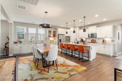 Discover the perfect blend of elegance and modern living in this on Verrado Golf Club - Victory in Arizona - for sale on GolfHomes.com, golf home, golf lot