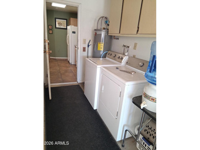 Rare 3-bedroom townhouse with an oversized private backyard! on Sun City Lakes West and East in Arizona - for sale on GolfHomes.com, golf home, golf lot