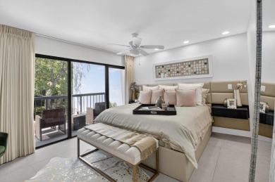 Welcome to an exquisite condo living in Boca West Country Club on Boca West Golf and Country Club in Florida - for sale on GolfHomes.com, golf home, golf lot