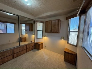 This 1989 Castle Park Model Home is in a beautiful 55+ age on Voyager RV Resort and Golf Course in Arizona - for sale on GolfHomes.com, golf home, golf lot