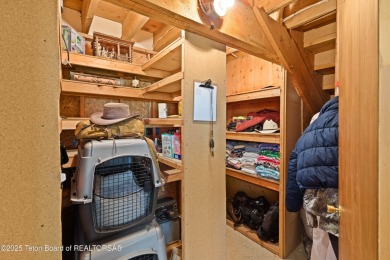 This beautiful log home combines rustic charm with modern on Star Valley RV Golf Course in Wyoming - for sale on GolfHomes.com, golf home, golf lot