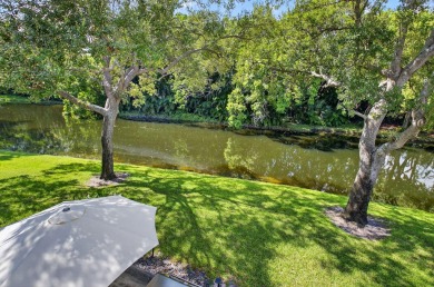 Welcome to an exquisite condo living in Boca West Country Club on Boca West Golf and Country Club in Florida - for sale on GolfHomes.com, golf home, golf lot