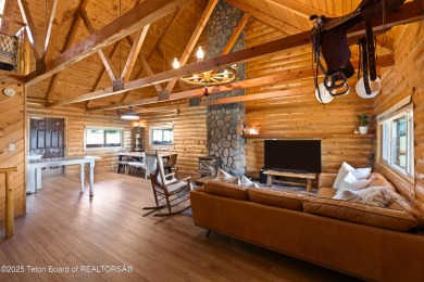 This beautiful log home combines rustic charm with modern on Star Valley RV Golf Course in Wyoming - for sale on GolfHomes.com, golf home, golf lot