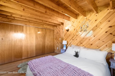 This beautiful log home combines rustic charm with modern on Star Valley RV Golf Course in Wyoming - for sale on GolfHomes.com, golf home, golf lot