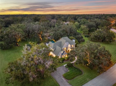 Under contract-accepting backup offers. Stunning custom home on Turkey Creek Golf and Country Club in Florida - for sale on GolfHomes.com, golf home, golf lot