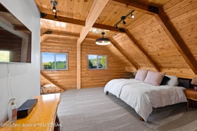 This beautiful log home combines rustic charm with modern on Star Valley RV Golf Course in Wyoming - for sale on GolfHomes.com, golf home, golf lot