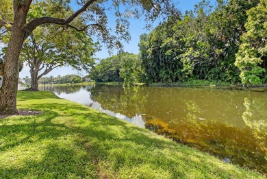 Welcome to an exquisite condo living in Boca West Country Club on Boca West Golf and Country Club in Florida - for sale on GolfHomes.com, golf home, golf lot