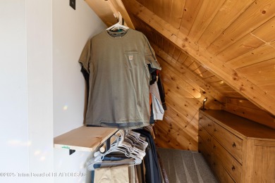 This beautiful log home combines rustic charm with modern on Star Valley RV Golf Course in Wyoming - for sale on GolfHomes.com, golf home, golf lot