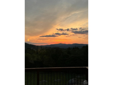 The Mountains Are Calling and I Must Go.'' P.S., I plan to be on Windham Country Club in New York - for sale on GolfHomes.com, golf home, golf lot