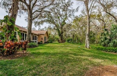 In Timber Greens a 55+ Gated Golf Community. This 3 Bedroom 2 on Timber Greens Country Club in Florida - for sale on GolfHomes.com, golf home, golf lot