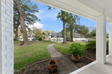 Welcome to your dream home in the sought-after Queens Harbour on Queens Harbour Yacht and Country Club in Florida - for sale on GolfHomes.com, golf home, golf lot