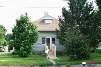 Welcome to this charming 3+1 bedroom home nestled in the on Friend Country Club Golf Course and Restaurant in Nebraska - for sale on GolfHomes.com, golf home, golf lot