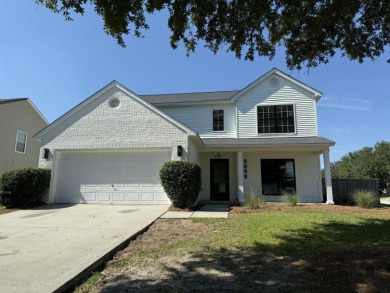 Perfectly positioned on a spacious corner lot in the highly on Golf Club At Wescott Plantation in South Carolina - for sale on GolfHomes.com, golf home, golf lot