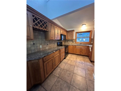 Wanting a get away but not the maintenance? Enjoy Table Rock on Holiday Island Executive Golf Course in Arkansas - for sale on GolfHomes.com, golf home, golf lot