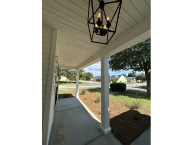 Perfectly positioned on a spacious corner lot in the highly on Golf Club At Wescott Plantation in South Carolina - for sale on GolfHomes.com, golf home, golf lot