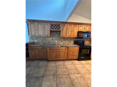 Wanting a get away but not the maintenance? Enjoy Table Rock on Holiday Island Executive Golf Course in Arkansas - for sale on GolfHomes.com, golf home, golf lot