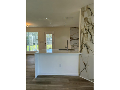Perfectly positioned on a spacious corner lot in the highly on Golf Club At Wescott Plantation in South Carolina - for sale on GolfHomes.com, golf home, golf lot
