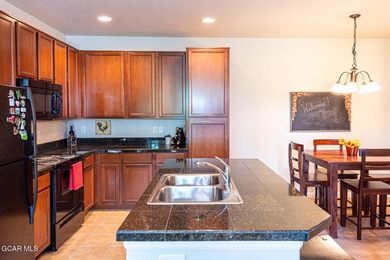 This bright and inviting mountain condo offers a spacious on Headwaters Golf Course At Granby Ranch in Colorado - for sale on GolfHomes.com, golf home, golf lot