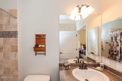 This bright and inviting mountain condo offers a spacious on Headwaters Golf Course At Granby Ranch in Colorado - for sale on GolfHomes.com, golf home, golf lot