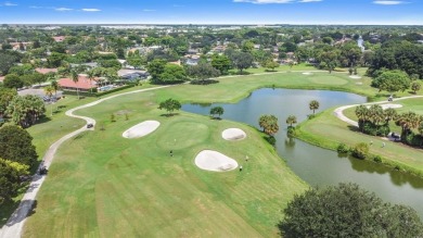 GOLF COURSE & WATER VIEW OASIS 4 Bdrms+office, 3 Baths oversized on Country Club of Coral Springs in Florida - for sale on GolfHomes.com, golf home, golf lot