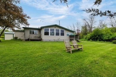 At the end of a quiet private road, sits this charming cedar on Alburg Golf Links in Vermont - for sale on GolfHomes.com, golf home, golf lot