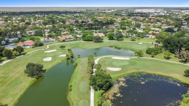 GOLF COURSE & WATER VIEW OASIS 4 Bdrms+office, 3 Baths oversized on Country Club of Coral Springs in Florida - for sale on GolfHomes.com, golf home, golf lot