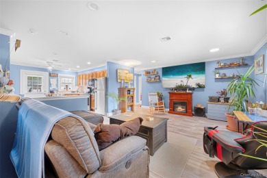 Move right into this beautiful 2-bedroom, 1-bathroom end-unit on Leisure Village Golf Course in New York - for sale on GolfHomes.com, golf home, golf lot