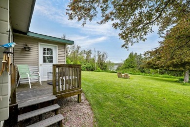 At the end of a quiet private road, sits this charming cedar on Alburg Golf Links in Vermont - for sale on GolfHomes.com, golf home, golf lot