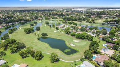 GOLF COURSE & WATER VIEW OASIS 4 Bdrms+office, 3 Baths oversized on Country Club of Coral Springs in Florida - for sale on GolfHomes.com, golf home, golf lot