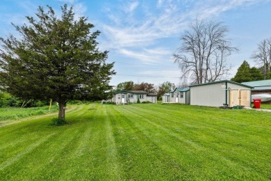 At the end of a quiet private road, sits this charming cedar on Alburg Golf Links in Vermont - for sale on GolfHomes.com, golf home, golf lot