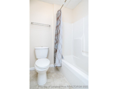 Welcome to this inviting 3-bedroom, 2-bathroom home nestled in on Hope Mills Golf and Country Club in North Carolina - for sale on GolfHomes.com, golf home, golf lot